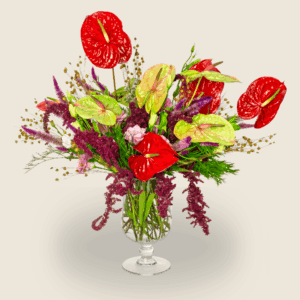 Anniversary vase arrangement with red and green anthuriums, pink eustoma, and amaranthus