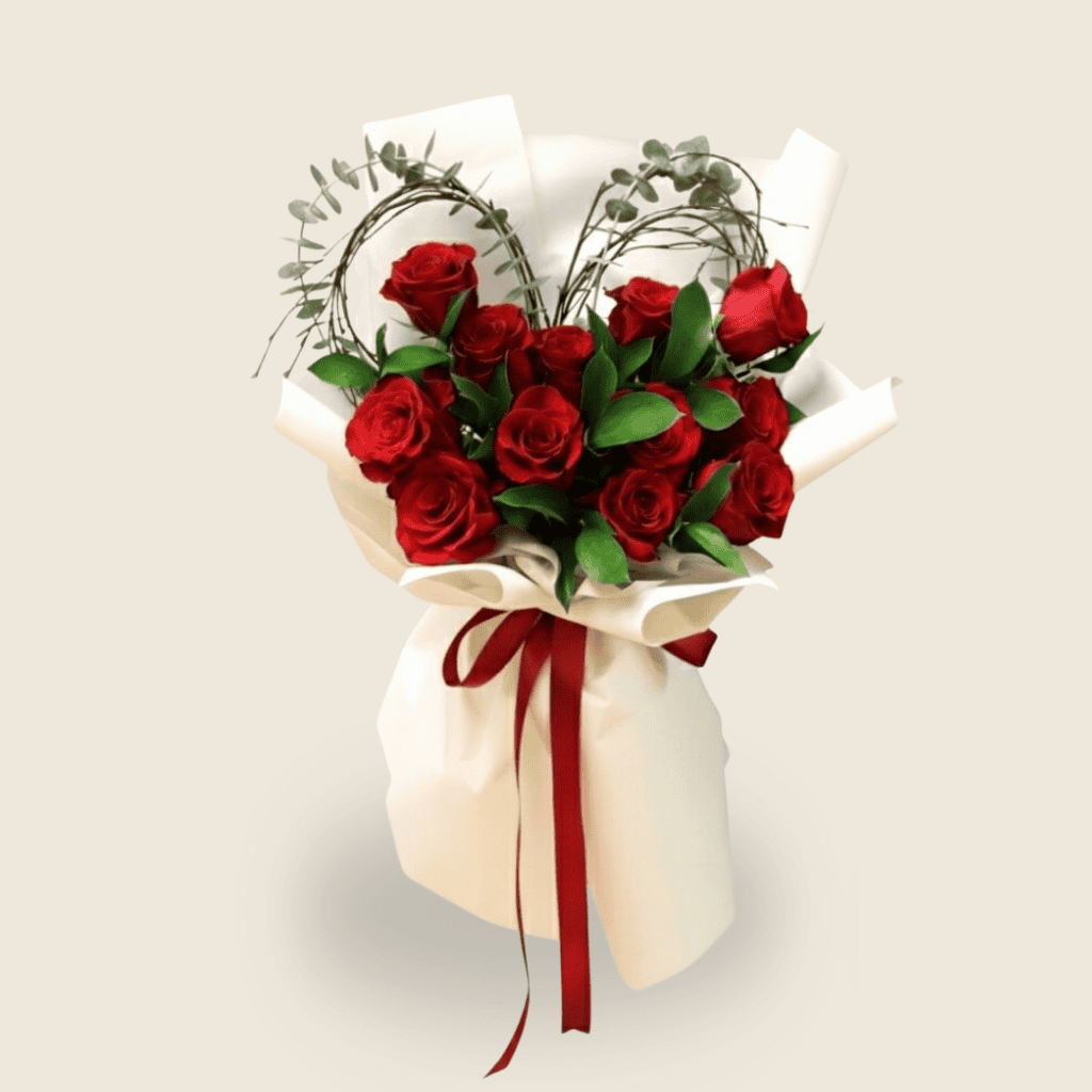 romantic red rose bouquet with heart-shaped twigs for anniversaries