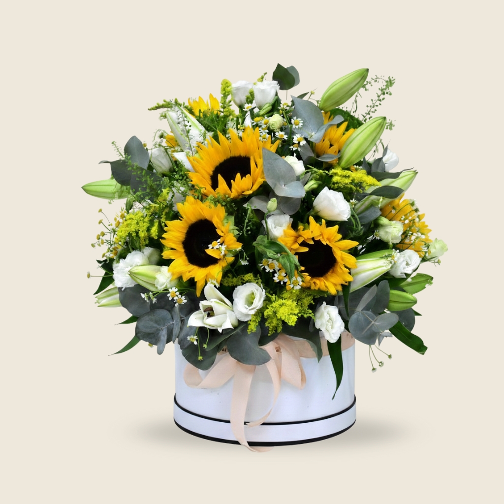 Sunflower and white lily round hatbox arrangement